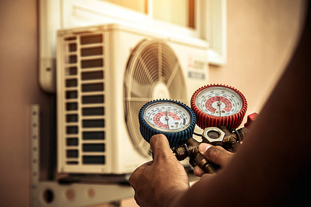 Professional Air Conditioning Service technician working in Medford, NJ